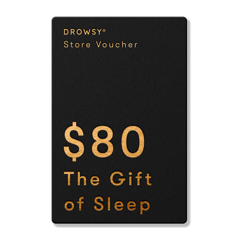 A black Drowsy Sleep Co. Gift Card from us.drowsysleepco with gold text: DROWSY Online Store Voucher, $80, The Gift of Sleep.