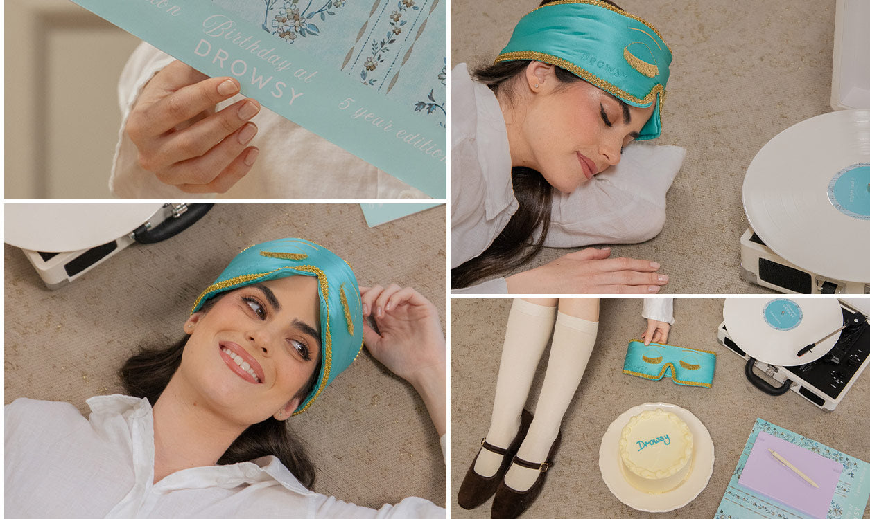 A woman in a turquoise sleep mask and headband relaxes on the floor with a record player, vinyl record, cake, and stationery, smiling and lying down in cozy, vintage-inspired scenes.