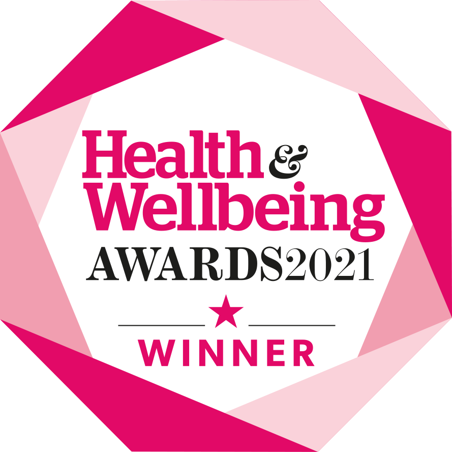 A pink and white geometric badge with the text Health & Wellbeing Awards 2021 Winner in bold, modern fonts, featuring a star beneath the word Winner.