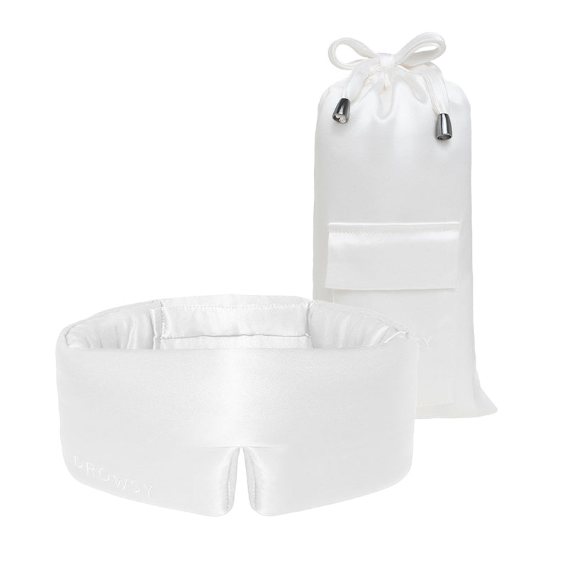 The drowsysleepco Akoya Pearl Sleep Mask is shown in front of its matching white silk drawstring pouch, both set against a simple background.