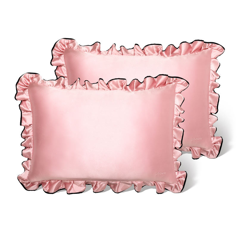 Two drowsysleepco Sleep and the City - Pink & Black Pillowcases with ruffled edges and black trim are shown overlapping on a white background.