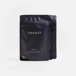 Three black resealable pouches of drowsysleepco Beauty Supplement Subscription, each labeled and containing 30 capsules, are displayed against a plain white background.