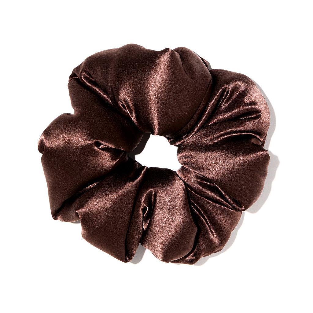 The drowsysleepco Cocoa Glow - Padded Scrunchie is a large, shiny brown silk hair accessory with a soft, gathered texture that adds volume, shown on a white background.
