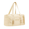 The Drowsy Silk Weekender - Dusty Gold by Drowsy features a beige quilted design, two long handles, a front pocket, and DROWSY embroidery—ideal for carrying your travel essentials in style.