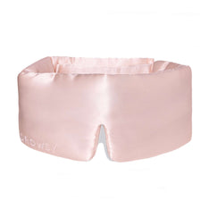Light pink Drowsy silk sleep mask on a white background