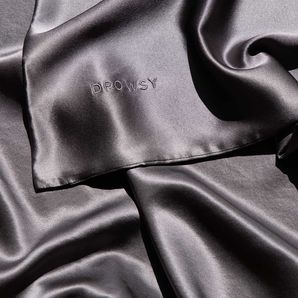 Drowsy-Sleep-Co.-Moonlight-Shadow-Silk-Pillowcase-closeup.jpg__PID:f32874e8-d94a-4d3c-af49-72be1eba434c