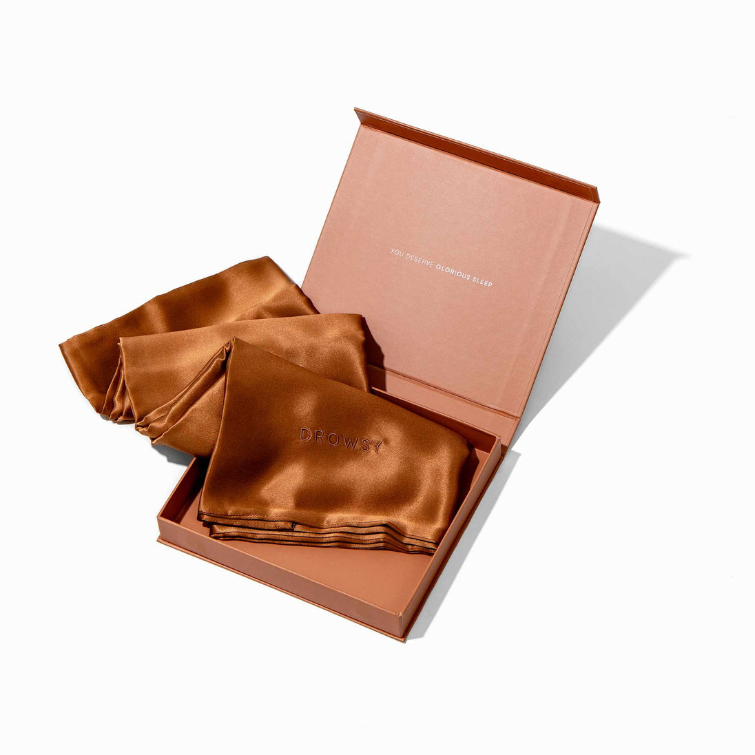 Terracotta pillowcase box opening with terracotta silk pillowcase inside