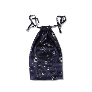 The us.drowsysleepco Cosmic Energy Silk Carry Pouch in navy features a celestial pattern of white and yellow stars, suns, and moons. It has silver-tipped strings, a front pocket subtly embossed with ROWS—ideal for your luxury sleep mask.