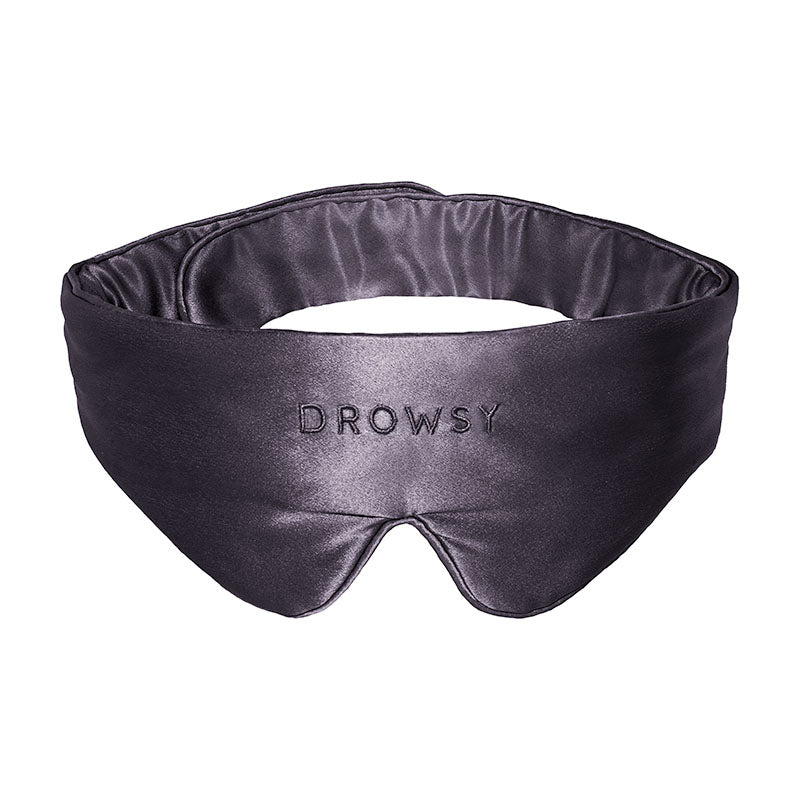 Introducing the Featherweight Silk Eye Mask Moonlight Shadow by us.drowsysleepco—a black eye mask crafted from luxurious mulberry silk, contoured for enhanced comfort and embroidered with 
