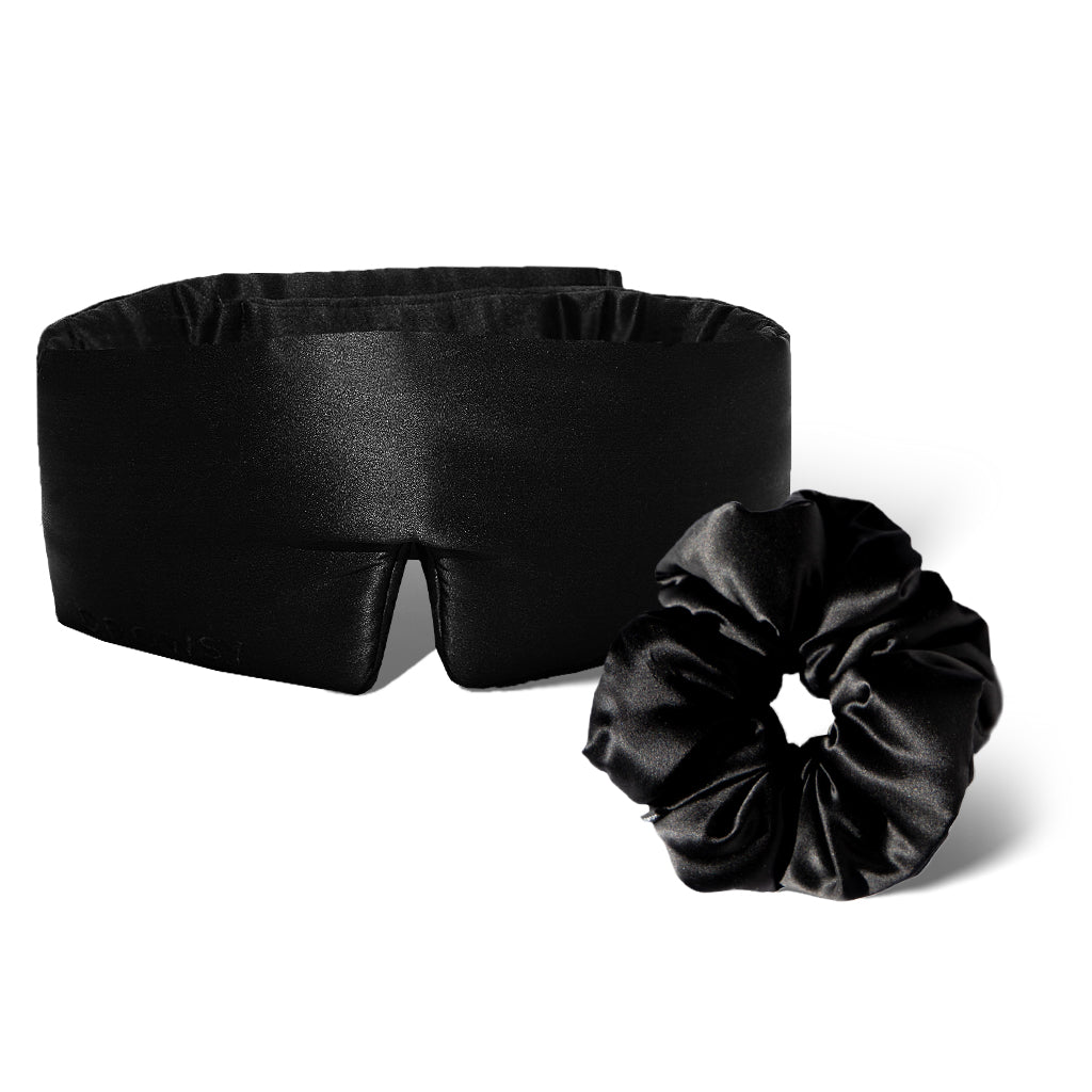 The drowsysleepco Silky Skin & Hair Bundle - Black Jade, featuring a pure silk sleep mask and matching black scrunchie, is displayed on a white background.