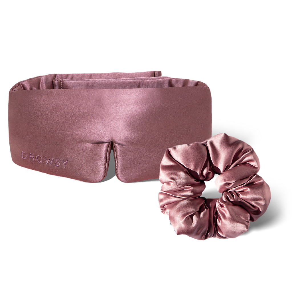 The drowsysleepco Silky Skin & Hair Bundle in Damask Rose features a blush pink silk sleep mask with "Drowsy" embroidery and a matching padded scrunchie, both shown on a white background.