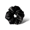The Black Jade - Padded Scrunchie by us.drowsysleepco, an oversized shiny black silk hair accessory, is shown in a circular shape on a white background with a subtle shadow.