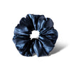 The us.drowsysleepco Midnight Blue - Padded Scrunchie, a dark blue oversized silk accessory, is shown on a white background with a soft shadow—ideal for boosting hair volume and promoting hair health.