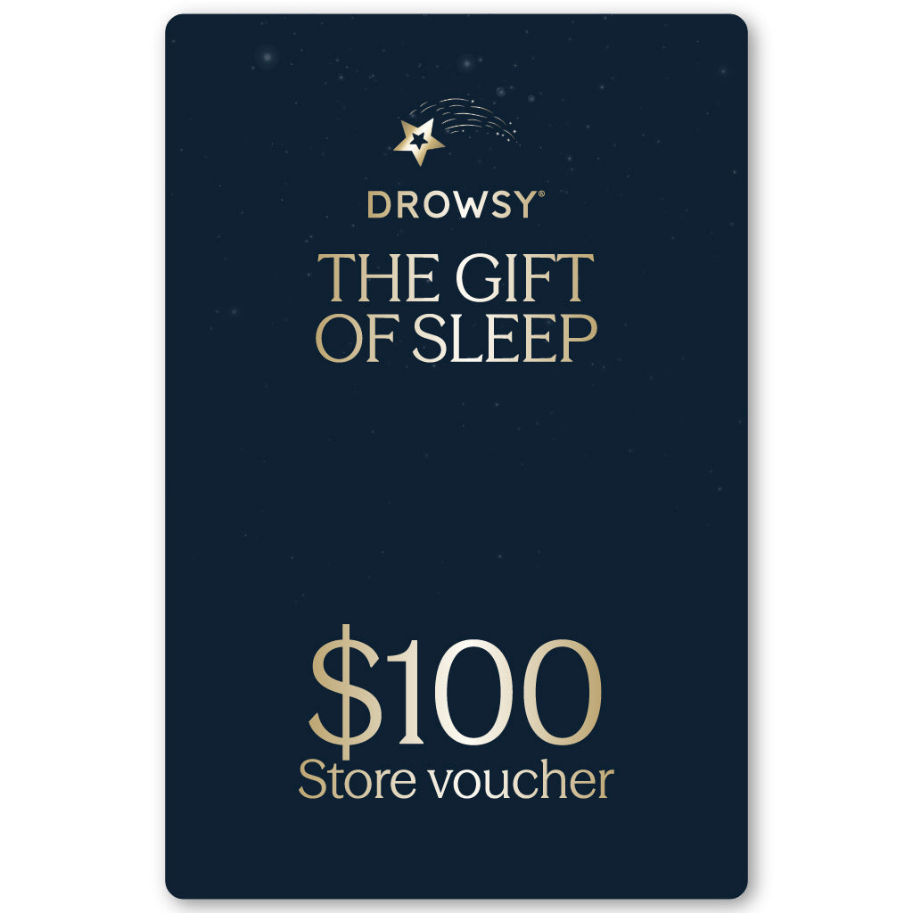 The Drowsy Sleep Co. Gift Card by us.drowsysleepco is a dark blue card with the Drowsy logo, "The Gift of Sleep," and a $100 online store voucher in gold lettering.