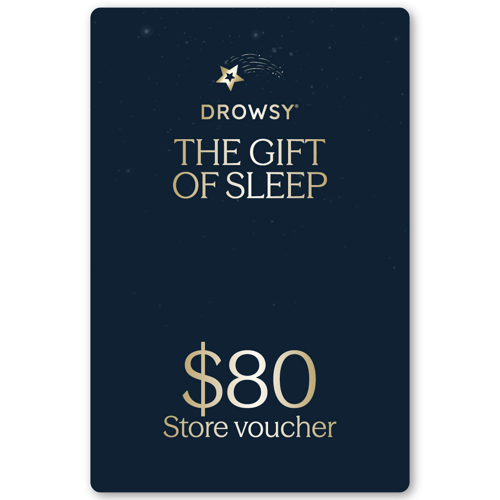 A dark blue Drowsy Sleep Co. Gift Card by us.drowsysleepco with gold "THE GIFT OF SLEEP" text, $80 store value, and a star and moon logo at the top.