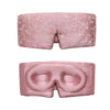 A front and back view of the Pride & Prejudice - English Rose Eyelash Protecting Sleep Mask, featuring a pink design with white floral embroidery and contoured eyecups to protect eyelashes.