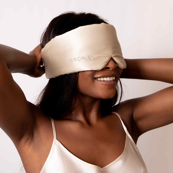 Female model with With Drowsy Sleep Co Silk Mask covering eyes